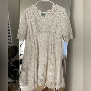 Nightcap x Free People eyelet and lace mini dress